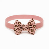 Girls pink cheetah bow band
