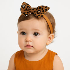 Girls brown cheetah bow band