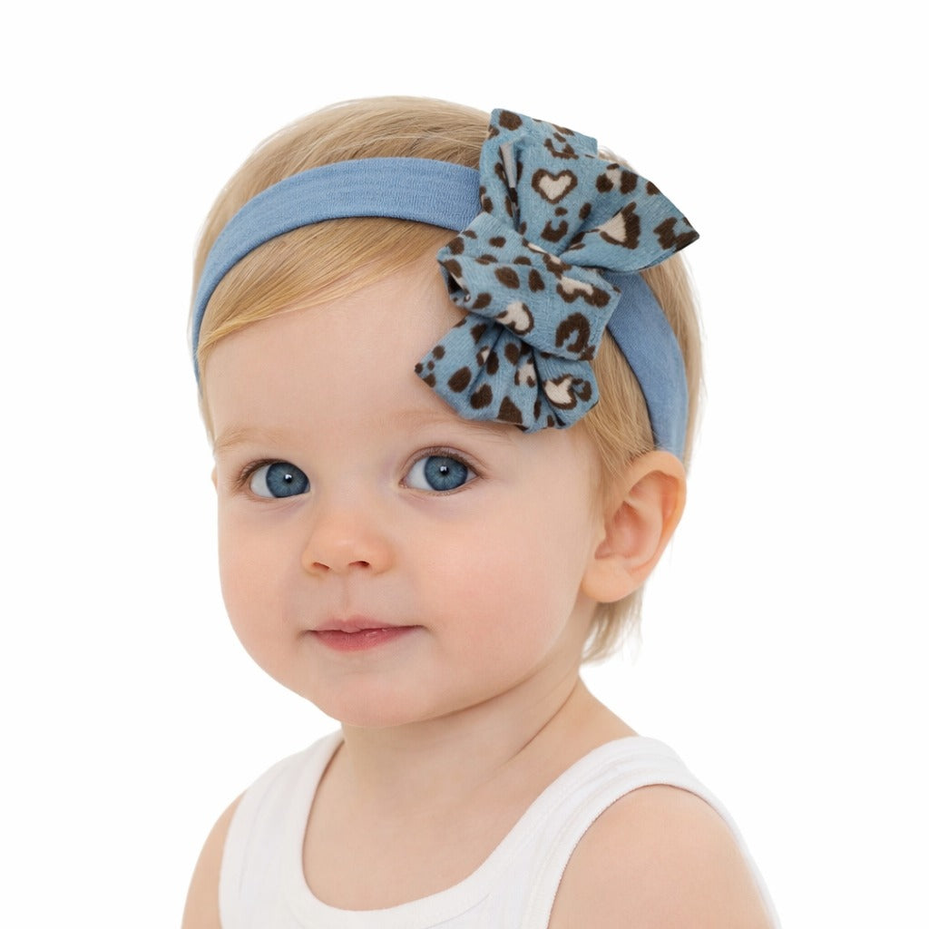 Girls sky blue cheetah bow band