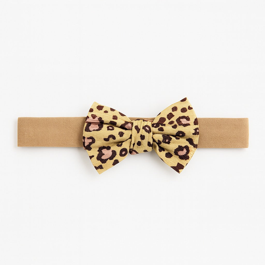 Girls brown cheetah bow band