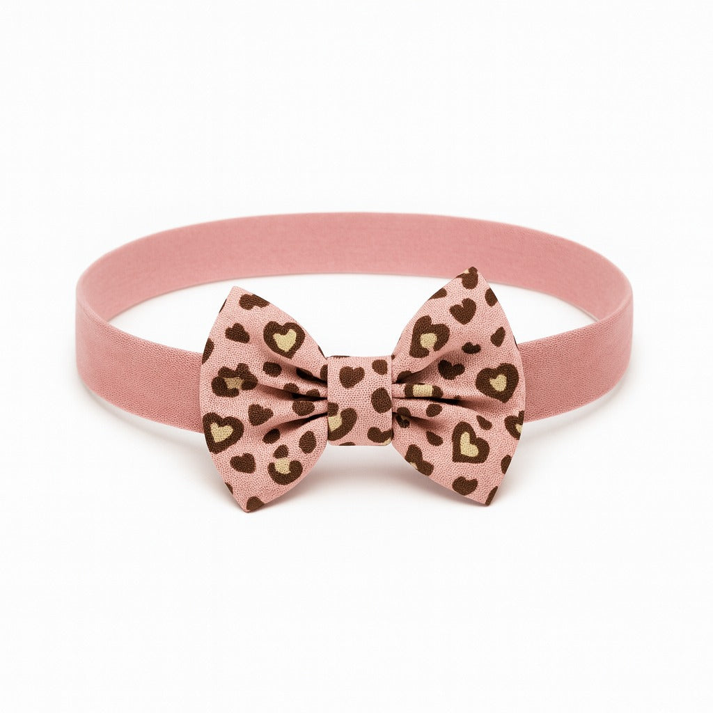 Girls pink cheetah bow band