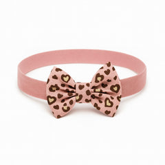 Girls pink cheetah bow band