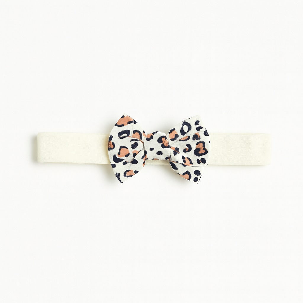 Girls white cheetah bow band