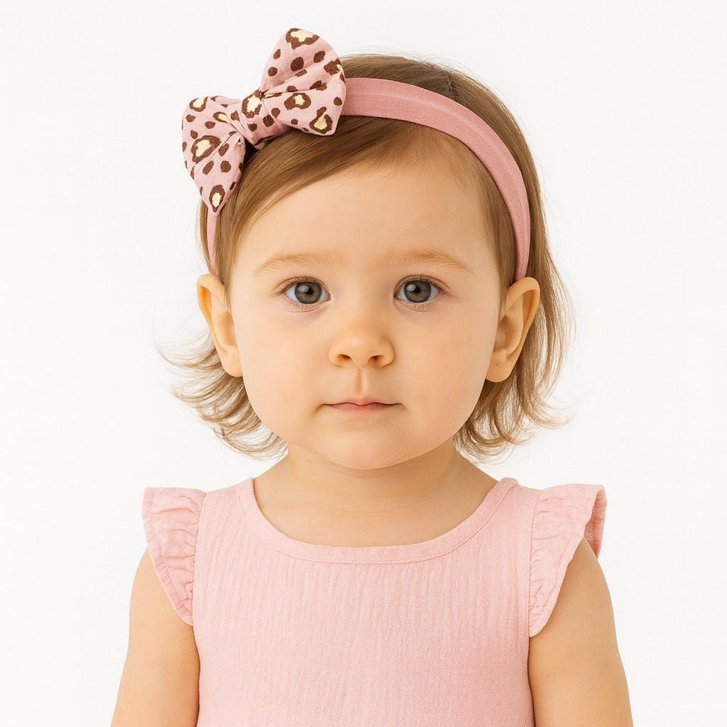 Girls pink cheetah bow band