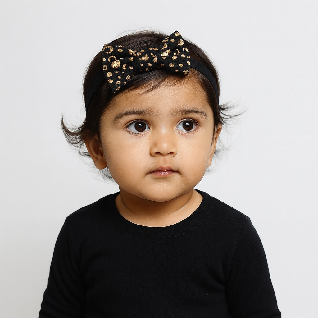 Girls black cheetah bow band